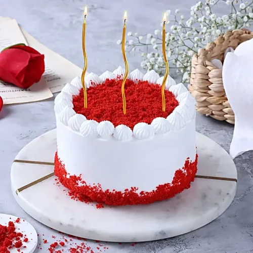Festive Red Cream Cake with Swirl Candles